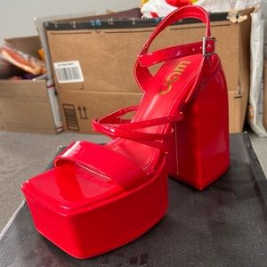 Red chunky platform heels